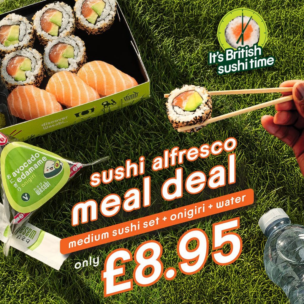 A hand with chopsticks holds sushi above a grass picnic. A sushi set, onigiri, wasabi, chopsticks, and a water bottle are visible. Text advertises a “sushi al fresco meal deal” for £8.95.